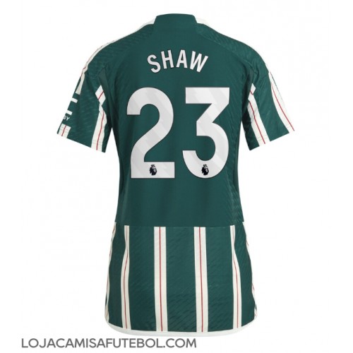 Camisa de Futebol Manchester United Luke Shaw #23 Equipamento Secundário Mulheres 2023-24 Manga Curta